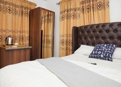 Aceh Executive Lodge - Lusaka - Bedroom