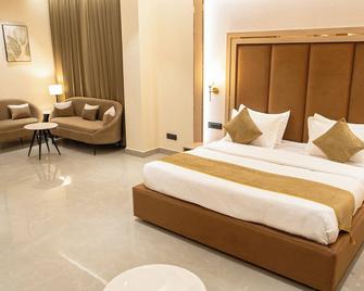 Hotel Quba - 魯得希阿那 - 臥室