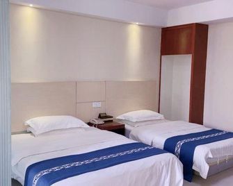 Xiaolanzheng Taihua Hotel - Zhongshan - Κρεβατοκάμαρα