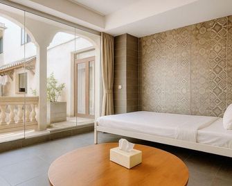 Haikou Old Arcade Street Serenity Guesthouse - Haikou - Bedroom