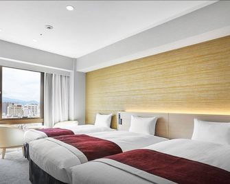 Daiwa Roynet Hotel Matsuyama - מאטסויאמה - חדר שינה