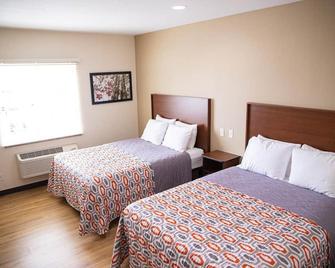 White House Suites - Plainfield - Schlafzimmer