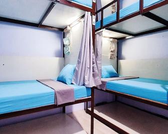 Mador Malang Dorm Hostel - Malang - Yatak Odası