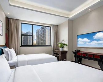 Chengdu Folk Inn - Chengdu - Camera da letto