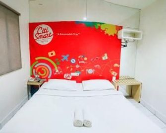 Citismart Bidadari Hotel - Pekanbaru - Schlafzimmer