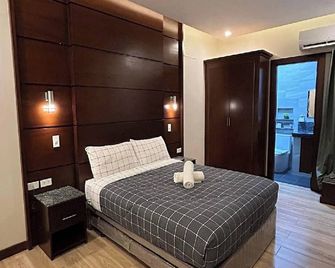 Jo Carter's Hotel and Suites Angeles City - Angeles City - Habitación
