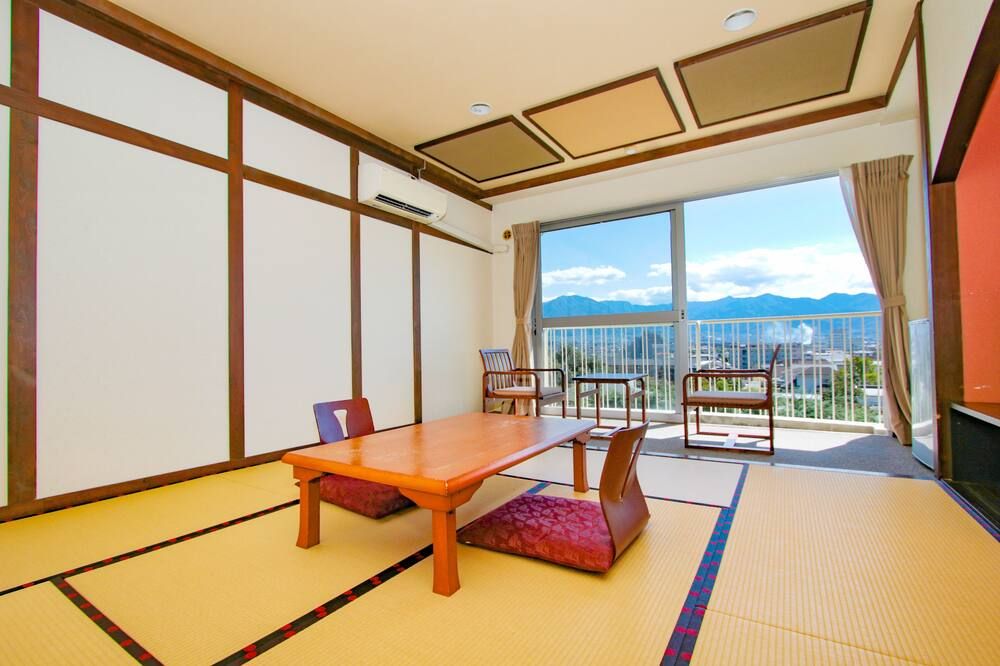 Ooedo Onsen Monogatari Hotel Shinko - Fuefuki - Eetruimte