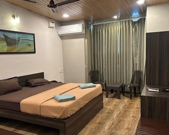 Hotel Coco Homes - Candolim - Slaapkamer