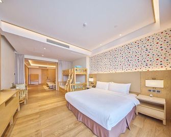 Nanjing Ziqing Lake Hot Spring Resort Hotel - Zhenjiang - Camera da letto