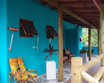 Suites Coqueiros Itamambuca - Ubatuba - Wohnzimmer