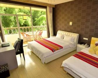 Ctn Li River Hotel - Guilin - Schlafzimmer