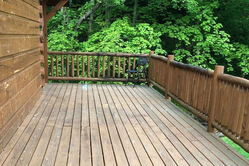 Balcony view of The Willow Cabin - Luxury Cabin on the Creek close to attractions