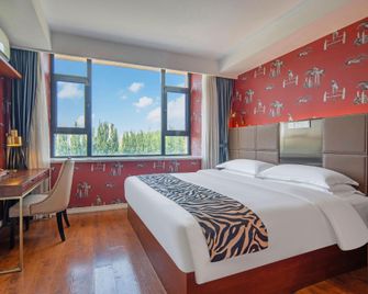 Zebra Hotel - Qingdao - Bedroom