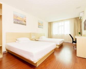 Hanting Express Qingdao Development Zone Taihangshan Road Branch - Qingdao - Bedroom