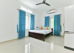 Bethel Gardens Top View provides you a comfy stay in the middle of foliage. - Ernakulam - Chambre