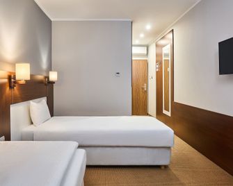 DeSilva Inn Katowice Airport - Піжовіце - Спальня