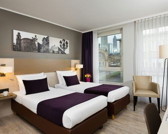 Leonardo Hotel Frankfurt City Center - Fráncfort - Habitación