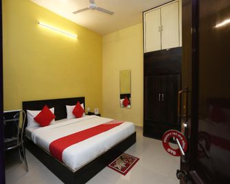 Hotel O Greenview Near Munshi Pulia Metro Station - Lucknow - Bedroom