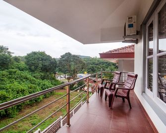 Treebo Trend Yajna Comforts - Madikeri - Balkón