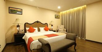 Hotel Atithi - Guwahati - Bedroom