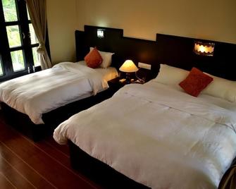 Rhino Lodge & Hotel - Sauraha - Makuuhuone