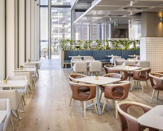 هوليداي إن إكسبرس أوكلاند سيتي س نترب باي آيتش جي - أوكلاند - مطعم