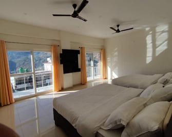 Hotel Nirvanam - Chamoli - Bedroom