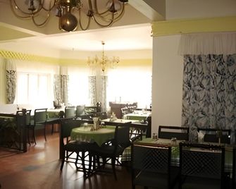 Royal Retreat - Munnar - Restaurante