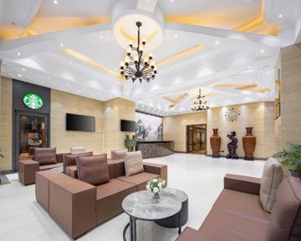 Xihe Hotel (Dalian Donggang Business District Zhongshan Square Metro Station Branch) - Dalian - Lobby
