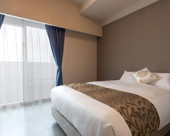 Mr.Kinjo Grand Blue Chatan - Chatan - Спальня