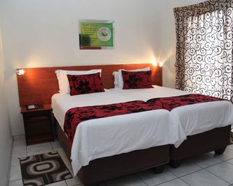 Scenery Guesthouse Stadium - מאסרו - חדר שינה