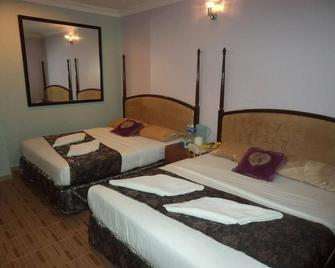 Kk Inn Hotel - Ampang - Schlafzimmer