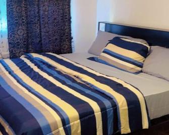 UD guest house - East Orange - Bedroom