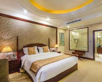 Cangzhou Huanghua Shengtai mingdun Hotel - Cangzhou - Habitación