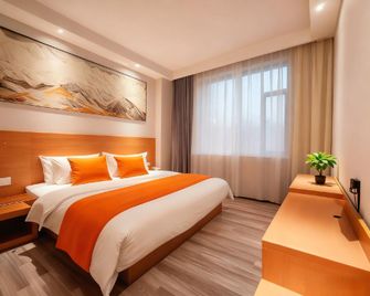 Celebrities Hotel (Golden City Center Pedestrian Street Branch) - Yulin - Bedroom