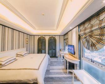 Caesar International Hotel - Huzhou - Habitación