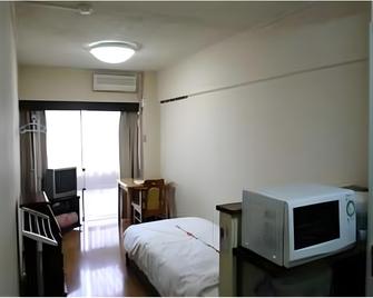 Condo Yokosuka Chateau Blanc - Yokosuka - Slaapkamer