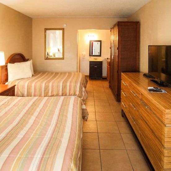 Bedroom view of Ans Inn & Suites