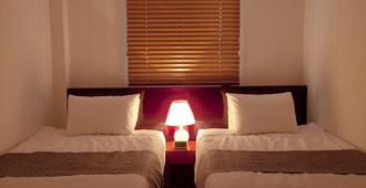Hotel Daewoo Inn - סיאול - חדר שינה