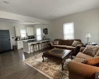 Lovely 2 Bed, 1.5 Bathroom Townhouse All New! - Hagaman - Living room