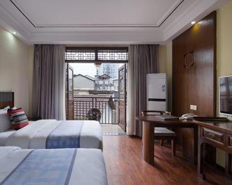 Zhangjiajie Debao Boutique Hotel - Zhangjiajie - Habitación