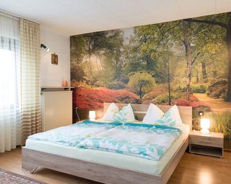 Enjoy your vacation in the heart of Merzig in a cozy 80sqm apartment - Merzig - Schlafzimmer