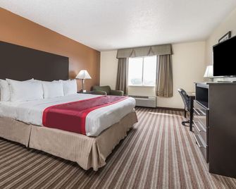 Days Inn & Suites by Wyndham Dallas - דאלאס - חדר שינה