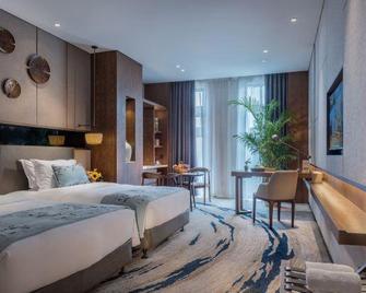 Yannian Plaza Hotel - Zhuzhou - Bedroom