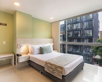 Hotel Suite Comfort - Medellín - Habitación