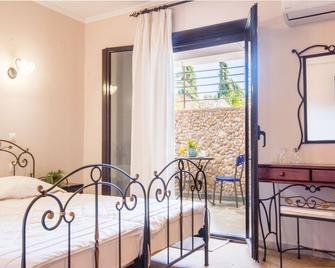 Nepheli Hotel - Kastrosikia - Bedroom