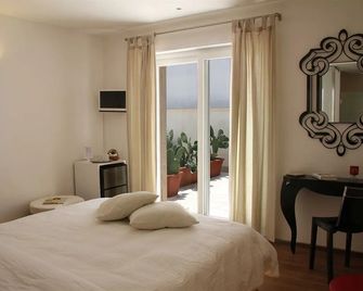 Beauty Beach Villa - מונופולי - חדר שינה