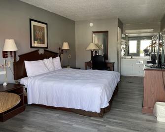 Covered Bridge Inn & Suites - Oneonta - Habitación