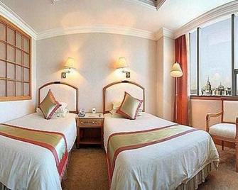 Green Land Hotel Kunming - คุนหมิง - ห้องนอน