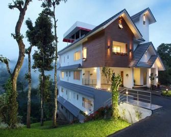Swiss County Resort - Munnar - Bina